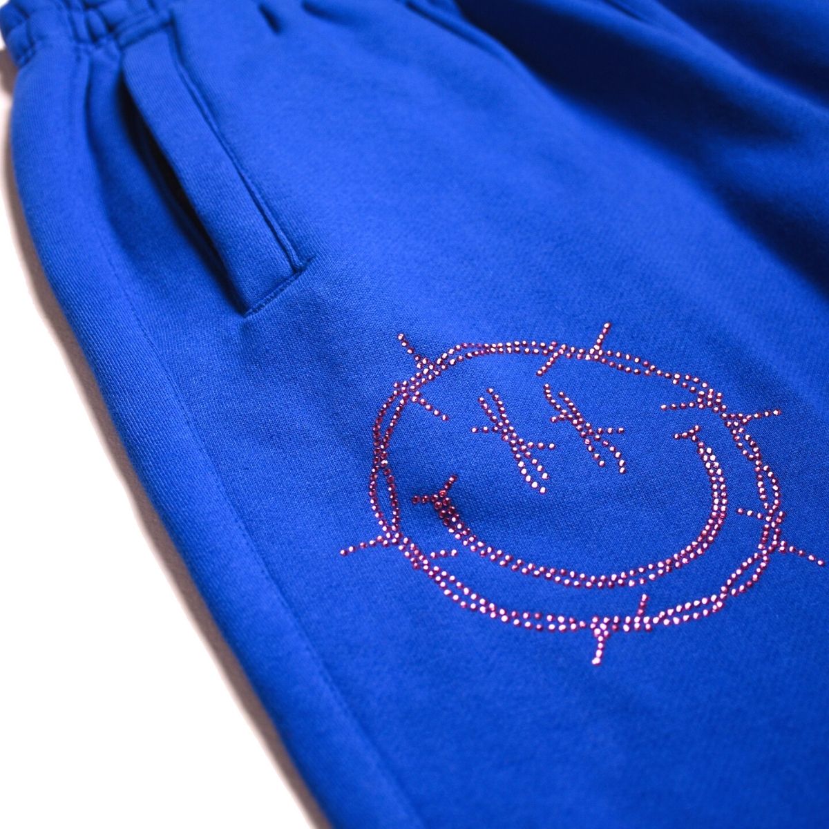 Royal Blue Rhinestone Sweats: Barbed Wire Smiley Face